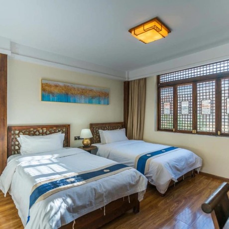 Imagen de la habitación del Hotel Floral Limaroonthai Shuhe. Foto 13