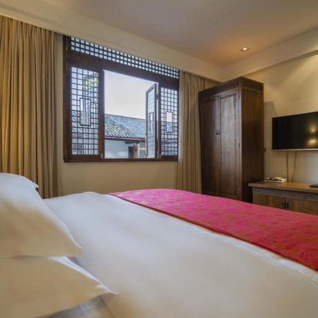 Imagen de la habitación del Hotel Floral Limaroonthai Shuhe. Foto 14