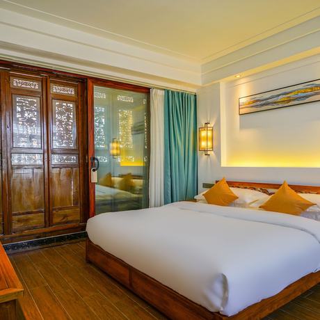 Imagen de la habitación del Hotel Floral Mi Yu Inn Lijiang. Foto 3
