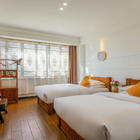 Imagen de la habitación del Hotel Floral Mi Yu Inn Lijiang. Foto 5