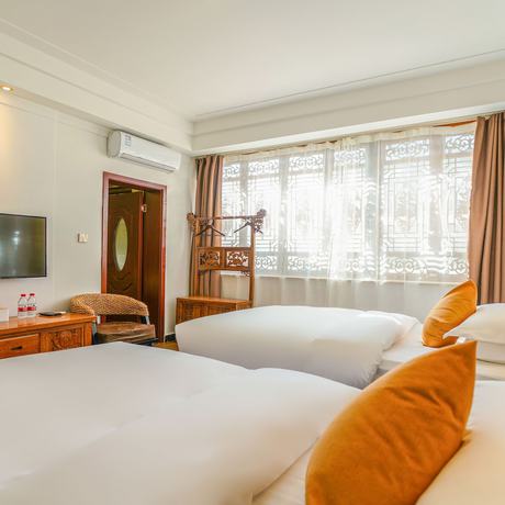 Imagen de la habitación del Hotel Floral Mi Yu Inn Lijiang. Foto 6