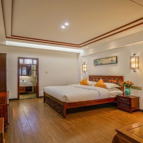 Imagen de la habitación del Hotel Floral Mi Yu Inn Lijiang. Foto 7