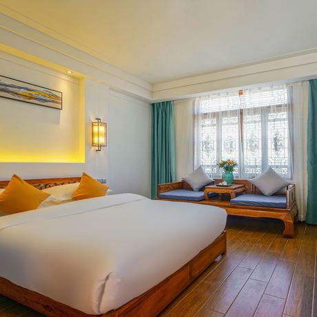 Imagen de la habitación del Hotel Floral Mi Yu Inn Lijiang. Foto 14