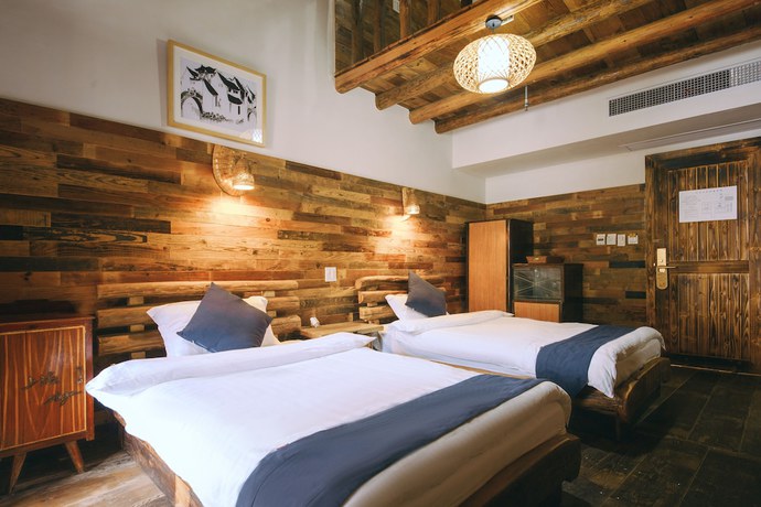 Imagen de la habitación del Hotel Floral Moganshan Yaozhuang. Foto 10