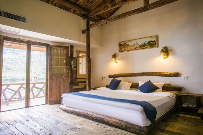 Imagen de la habitación del Hotel Floral Moganshan Yaozhuang. Foto 12