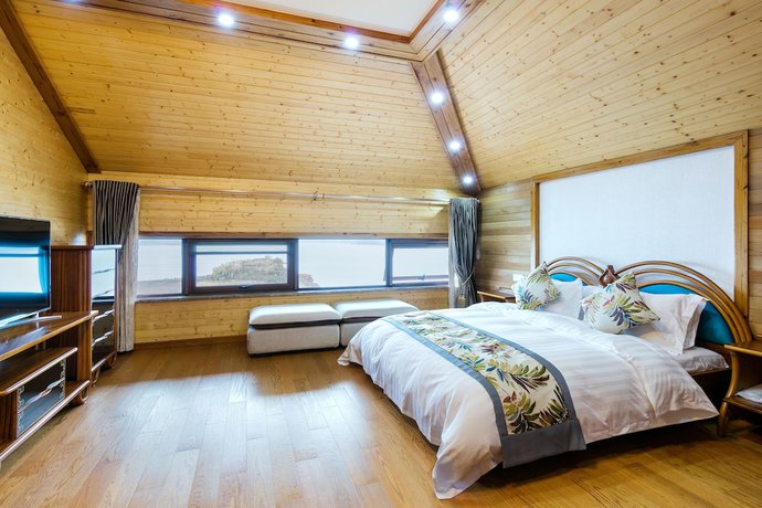 Imagen de la habitación del Hotel Floral Qiandaohu Shangju Villa. Foto 2