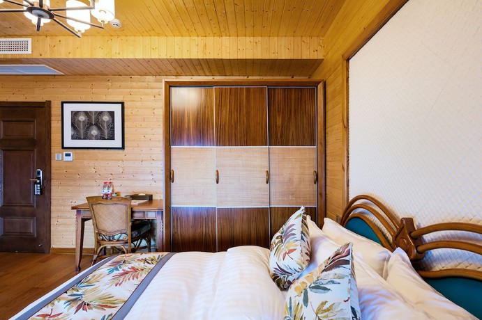 Imagen de la habitación del Hotel Floral Qiandaohu Shangju Villa. Foto 4