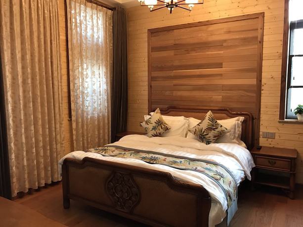 Imagen de la habitación del Hotel Floral Qiandaohu Shangju Villa. Foto 5