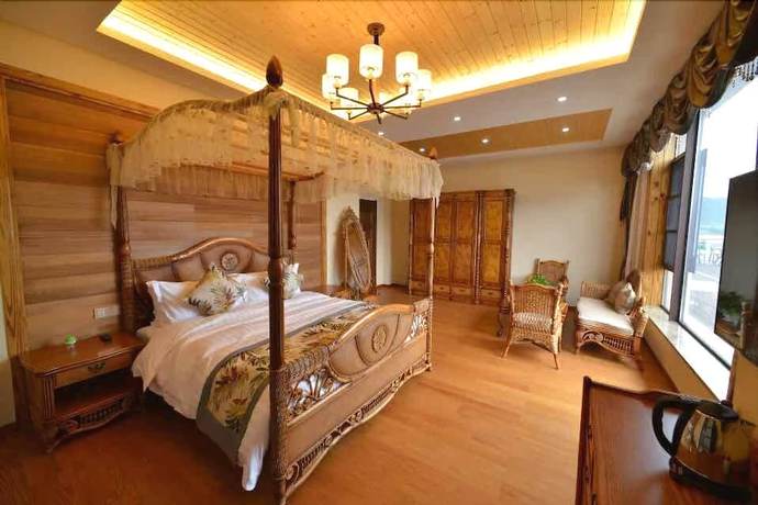 Imagen de la habitación del Hotel Floral Qiandaohu Shangju Villa. Foto 9