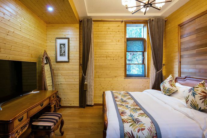 Imagen de la habitación del Hotel Floral Qiandaohu Shangju Villa. Foto 10