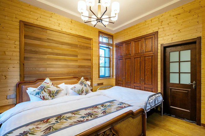 Imagen de la habitación del Hotel Floral Qiandaohu Shangju Villa. Foto 13