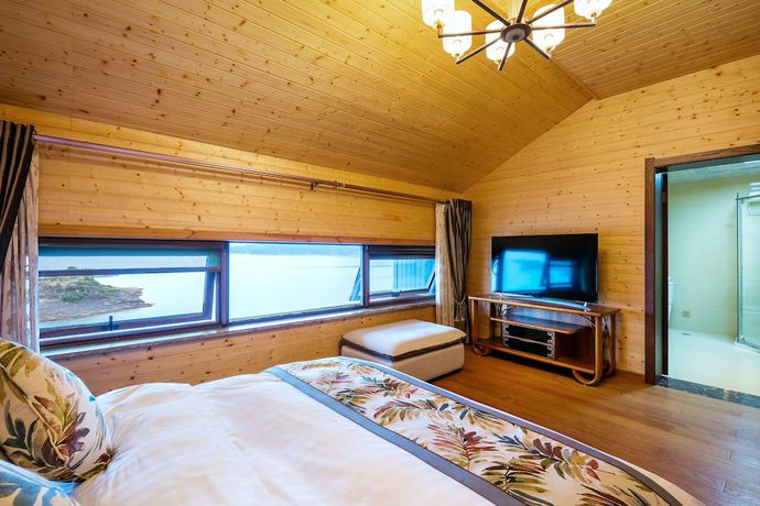 Imagen de la habitación del Hotel Floral Qiandaohu Shangju Villa. Foto 14