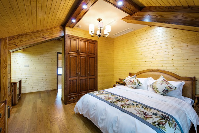 Imagen de la habitación del Hotel Floral Qiandaohu Shangju Villa. Foto 15