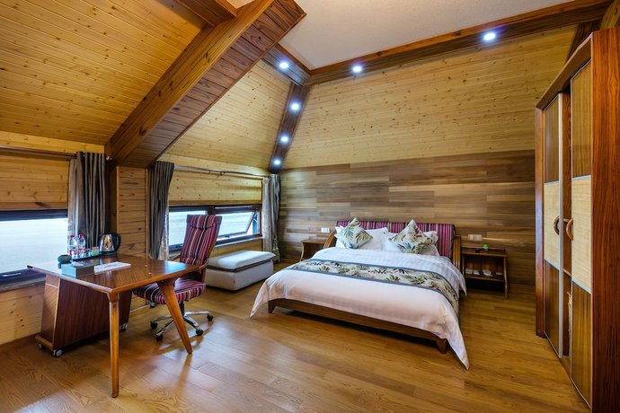 Imagen de la habitación del Hotel Floral Qiandaohu Shangju Villa. Foto 16