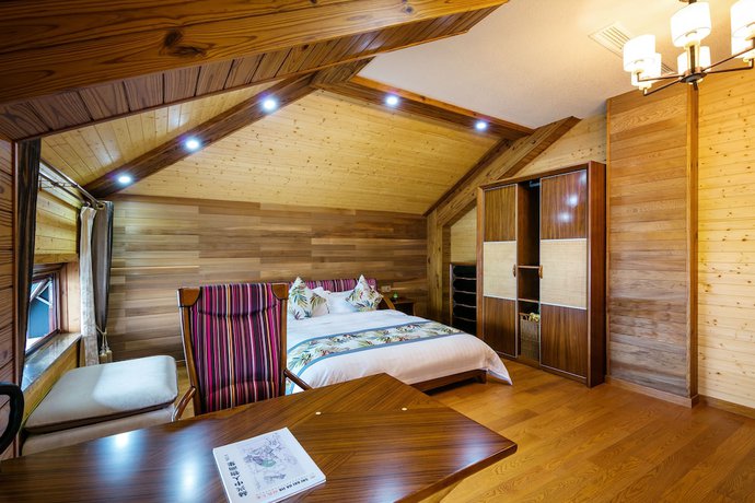 Imagen de la habitación del Hotel Floral Qiandaohu Shangju Villa. Foto 19