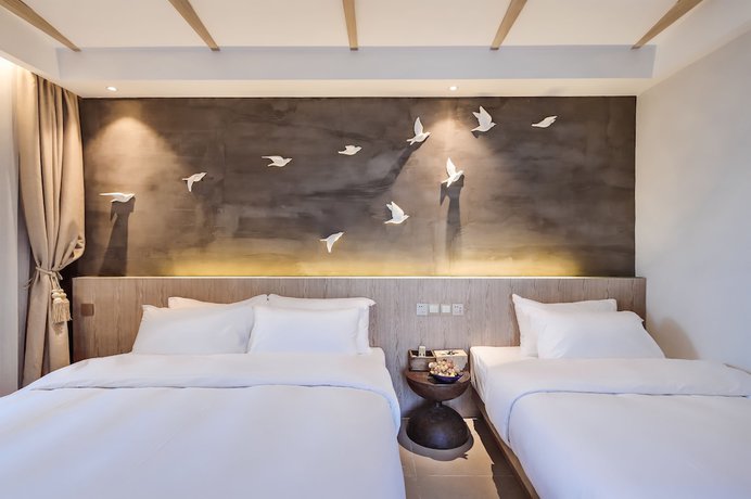 Imagen de la habitación del Hotel Floral Sea Say Villa Wenling. Foto 2