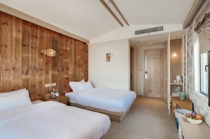 Imagen de la habitación del Hotel Floral Sea Say Villa Wenling. Foto 4