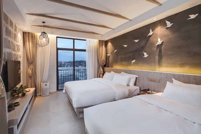 Imagen de la habitación del Hotel Floral Sea Say Villa Wenling. Foto 8