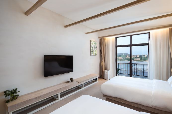 Imagen de la habitación del Hotel Floral Sea Say Villa Wenling. Foto 12