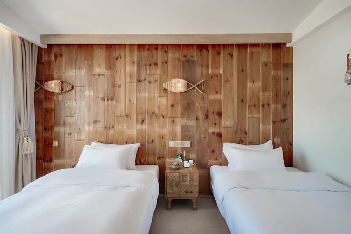 Imagen de la habitación del Hotel Floral Sea Say Villa Wenling. Foto 16