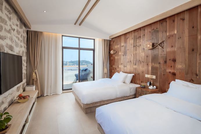 Imagen de la habitación del Hotel Floral Sea Say Villa Wenling. Foto 18