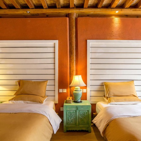Imagen de la habitación del Hotel Floral Sen Du Lijiang. Foto 11