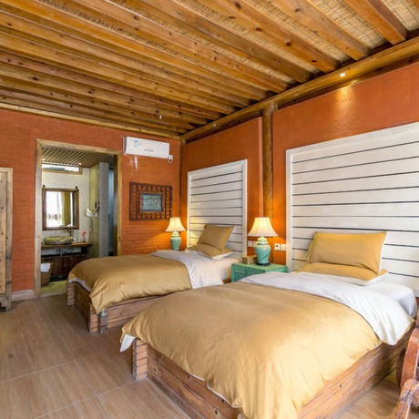 Imagen de la habitación del Hotel Floral Sen Du Lijiang. Foto 12