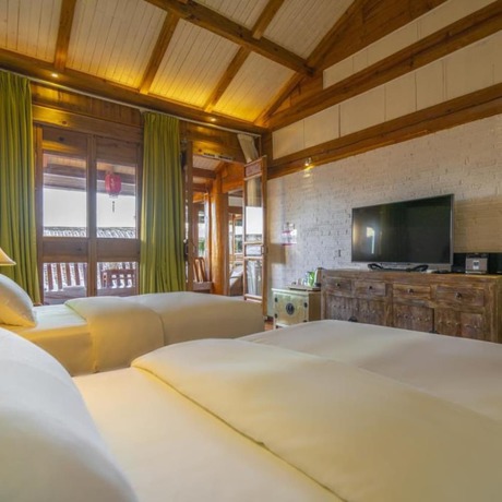 Imagen de la habitación del Hotel Floral Sen Du Lijiang. Foto 15