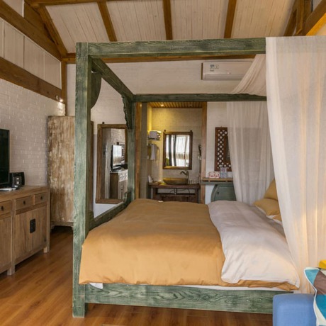 Imagen de la habitación del Hotel Floral Sen Du Lijiang. Foto 17