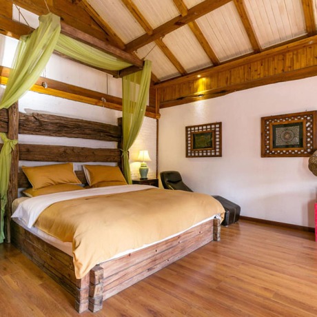 Imagen de la habitación del Hotel Floral Sen Du Lijiang. Foto 20