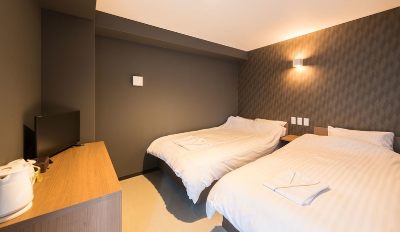 Imagen de la habitación del Hotel Floral Shinsaibasi. Foto 5