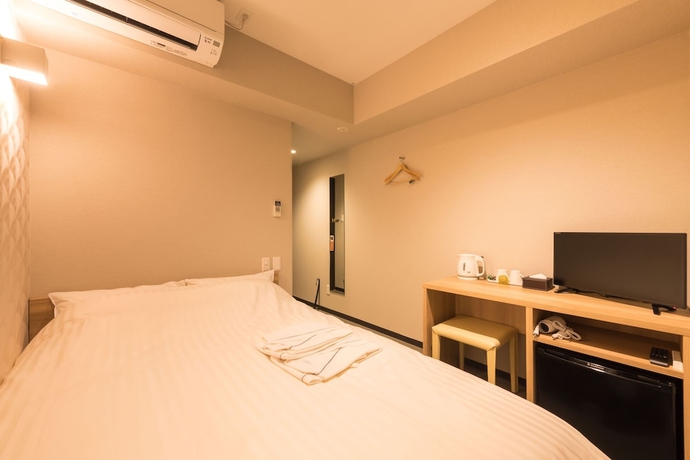Imagen de la habitación del Hotel Floral Shinsaibasi. Foto 11