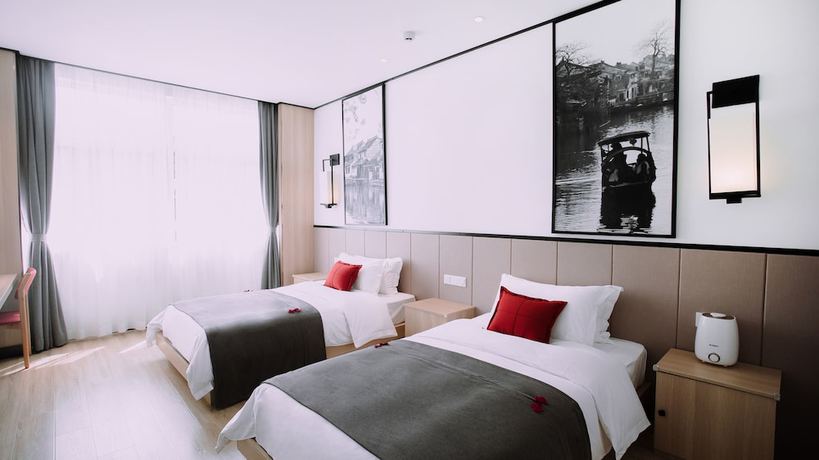 Imagen de la habitación del Hotel Floral Wuzhen Linshuige. Foto 6