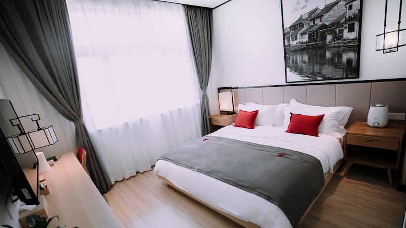 Imagen de la habitación del Hotel Floral Wuzhen Linshuige. Foto 11