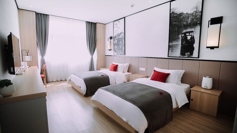 Imagen de la habitación del Hotel Floral Wuzhen Linshuige. Foto 14