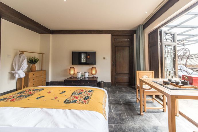 Imagen de la habitación del Hotel Floral Yun Xi Lijiang. Foto 2