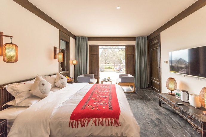 Imagen de la habitación del Hotel Floral Yun Xi Lijiang. Foto 3