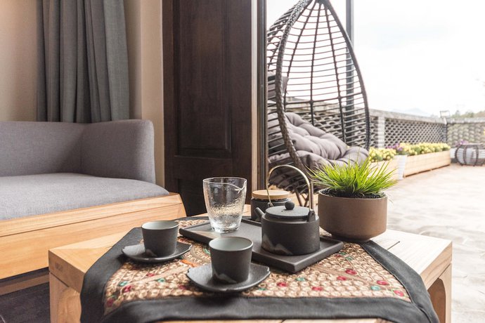 Imagen de la habitación del Hotel Floral Yun Xi Lijiang. Foto 4