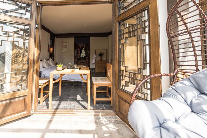 Imagen de la habitación del Hotel Floral Yun Xi Lijiang. Foto 7