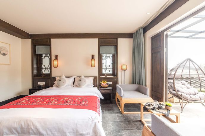 Imagen de la habitación del Hotel Floral Yun Xi Lijiang. Foto 11