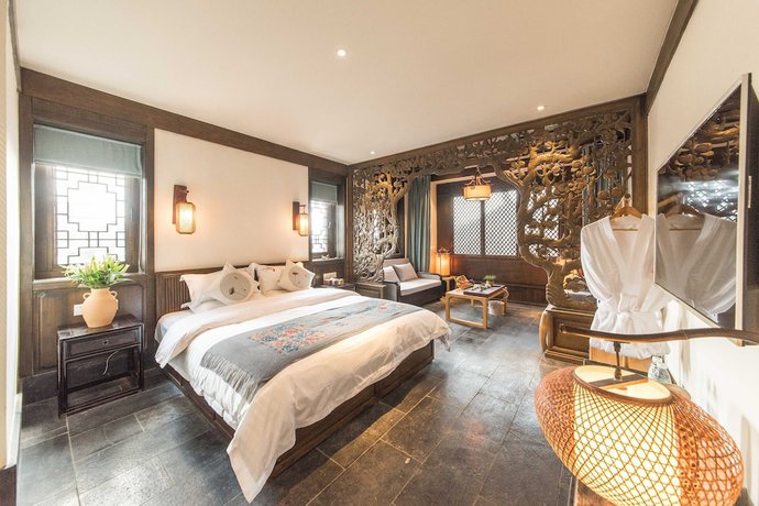 Imagen de la habitación del Hotel Floral Yun Xi Lijiang. Foto 13