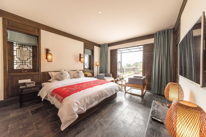 Imagen de la habitación del Hotel Floral Yun Xi Lijiang. Foto 15