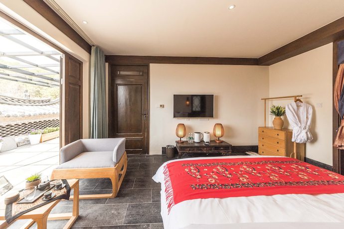 Imagen de la habitación del Hotel Floral Yun Xi Lijiang. Foto 16