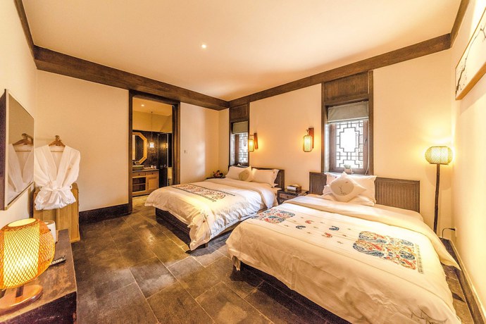 Imagen de la habitación del Hotel Floral Yun Xi Lijiang. Foto 17