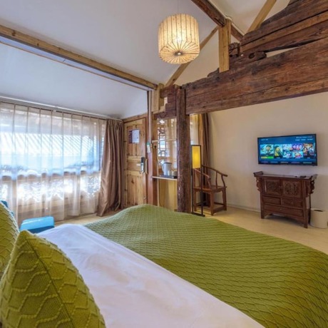 Imagen de la habitación del Hotel Floral &middot; Fu Sheng Xiang Lijiang. Foto 16