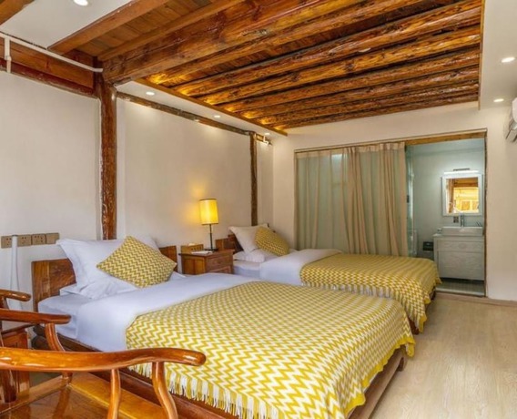 Imagen de la habitación del Hotel Floral &middot; Fu Sheng Xiang Lijiang. Foto 18
