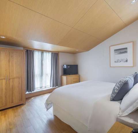 Imagen de la habitación del Hotel Floral · Hefu Boutique Inn. Foto 10