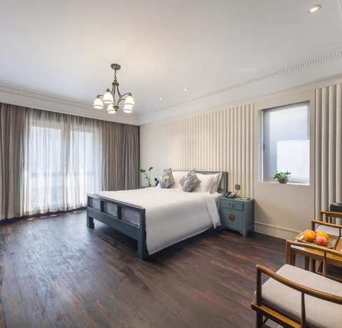 Imagen de la habitación del Hotel Floral · Hefu Boutique Inn. Foto 11