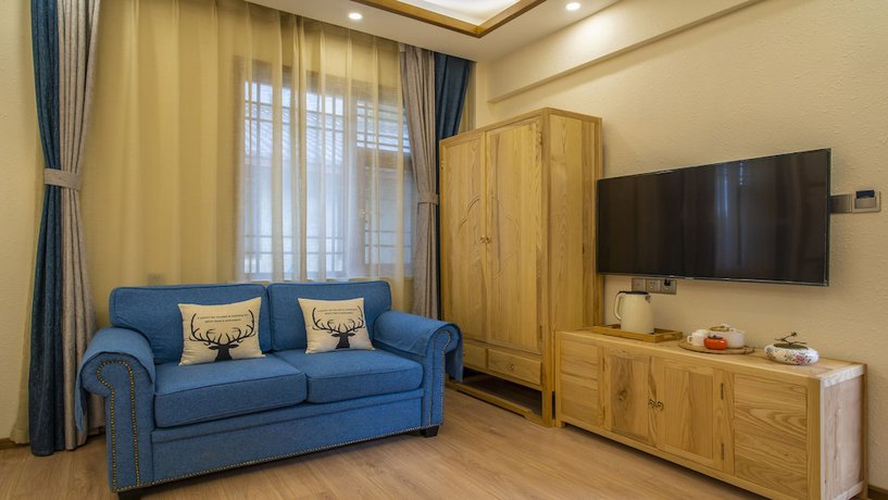 Imagen de la habitación del Hotel Floral &middot; Rushuang Courtyard Lijiang. Foto 2