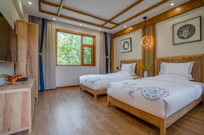 Imagen de la habitación del Hotel Floral &middot; Rushuang Courtyard Lijiang. Foto 3